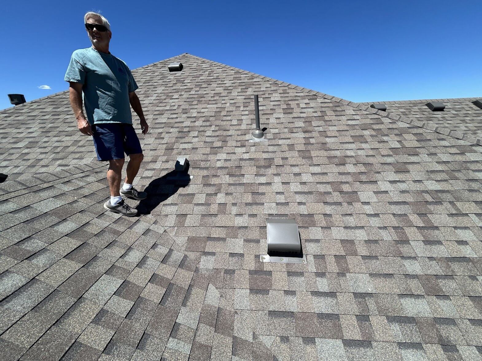 Rural home in Franktown, Colorado with a completed asphalt shingle roof by ARCM Roofing